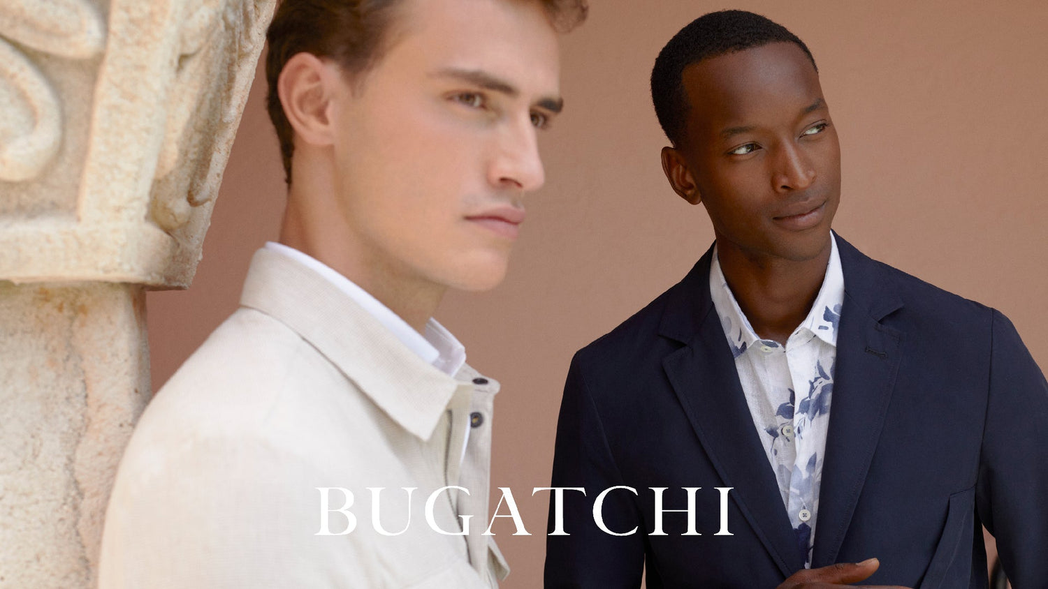 Two men in suits stand near a stone column against a peach wall. The word BUGATCHI is displayed at the bottom of the image.