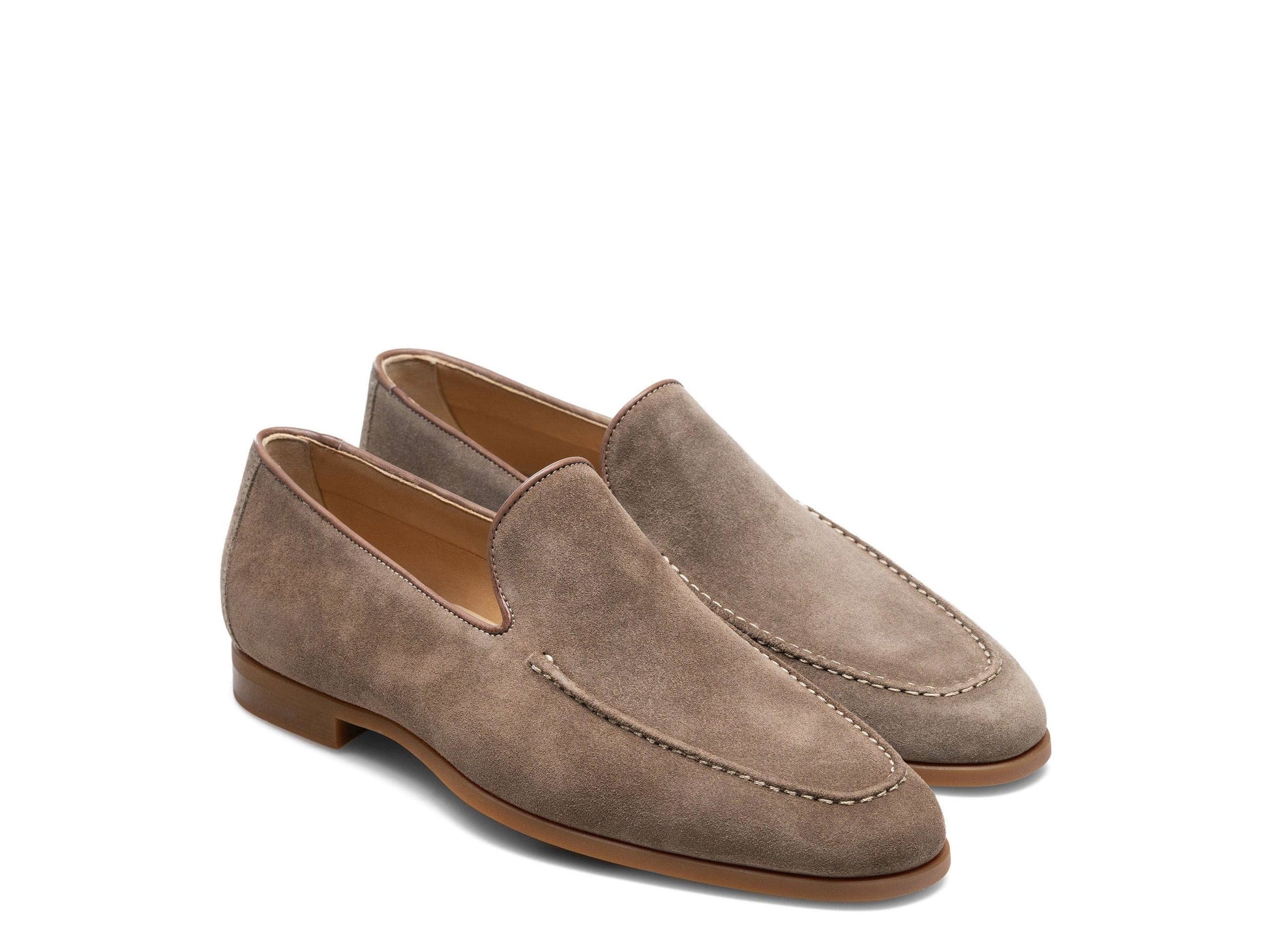 The Magnanni Lecera II Suede Loafer by Magnanni is a pair of light brown suede Venetian loafers featuring visible stitching, low stacked heels, a leather upper trim, and a lightweight rubber sole, displayed on a white background.