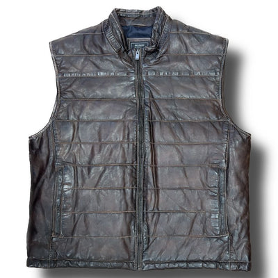 The Missani Leather Vest by Missani is a sleeveless brown vest made from Italian lambskin leather, featuring horizontal stitching and a front zipper, shown on a white background.