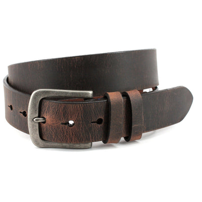 The Torino Distressed Waxed Harness Leather Belt by Torino is made in the USA, features brown distressed leather, a silver rectangular buckle, and multiple adjustment holes—ideal as a versatile casual accessory for everyday wear.