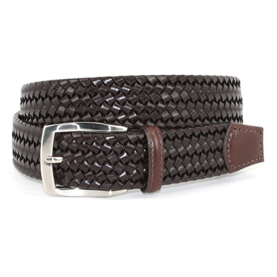 The Torino Italian Woven Stretch Leather Belt in dark brown leather with a silver buckle from Torino is coiled on a white background.