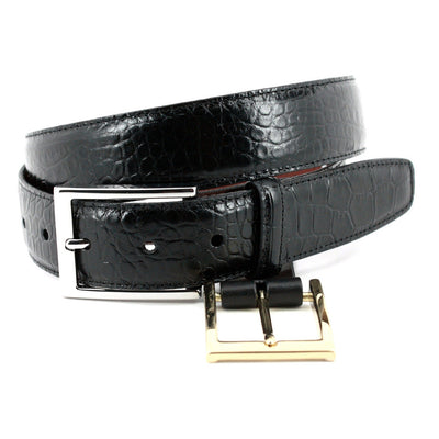 The Torino Faux Alligator Grain Embossed Calfskin Belt Big & Tall features a black calfskin strap with alligator embossing, a silver rectangular buckle, and an optional gold buckle—showcasing Torino's signature quality.