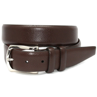 The Torino Italian Bulgaro Calfskin Belt by Torino features top grain calfskin, a silver buckle, and glove leather lining, shown coiled against a white background.