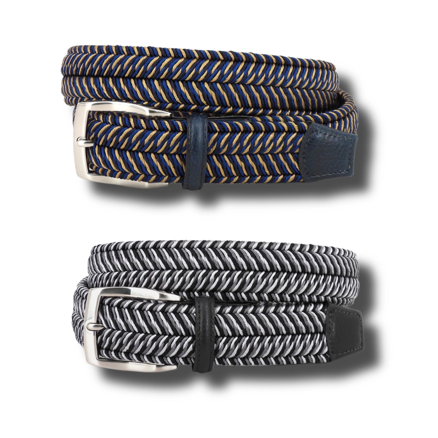 Two Torino Italian Woven Herringbone Stretch Belts—one blue/yellow, the other black/white—are coiled side by side on a white background, highlighting Torino’s signature craftsmanship.