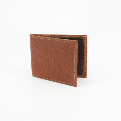 A Torino Genuine Bison Leather Billfold Wallet, brown with visible stitching, is displayed slightly open against a plain white background.