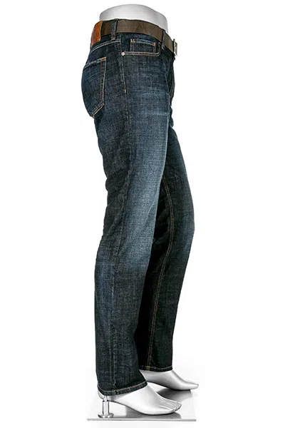 Blue jeans on a mannequin with a white background