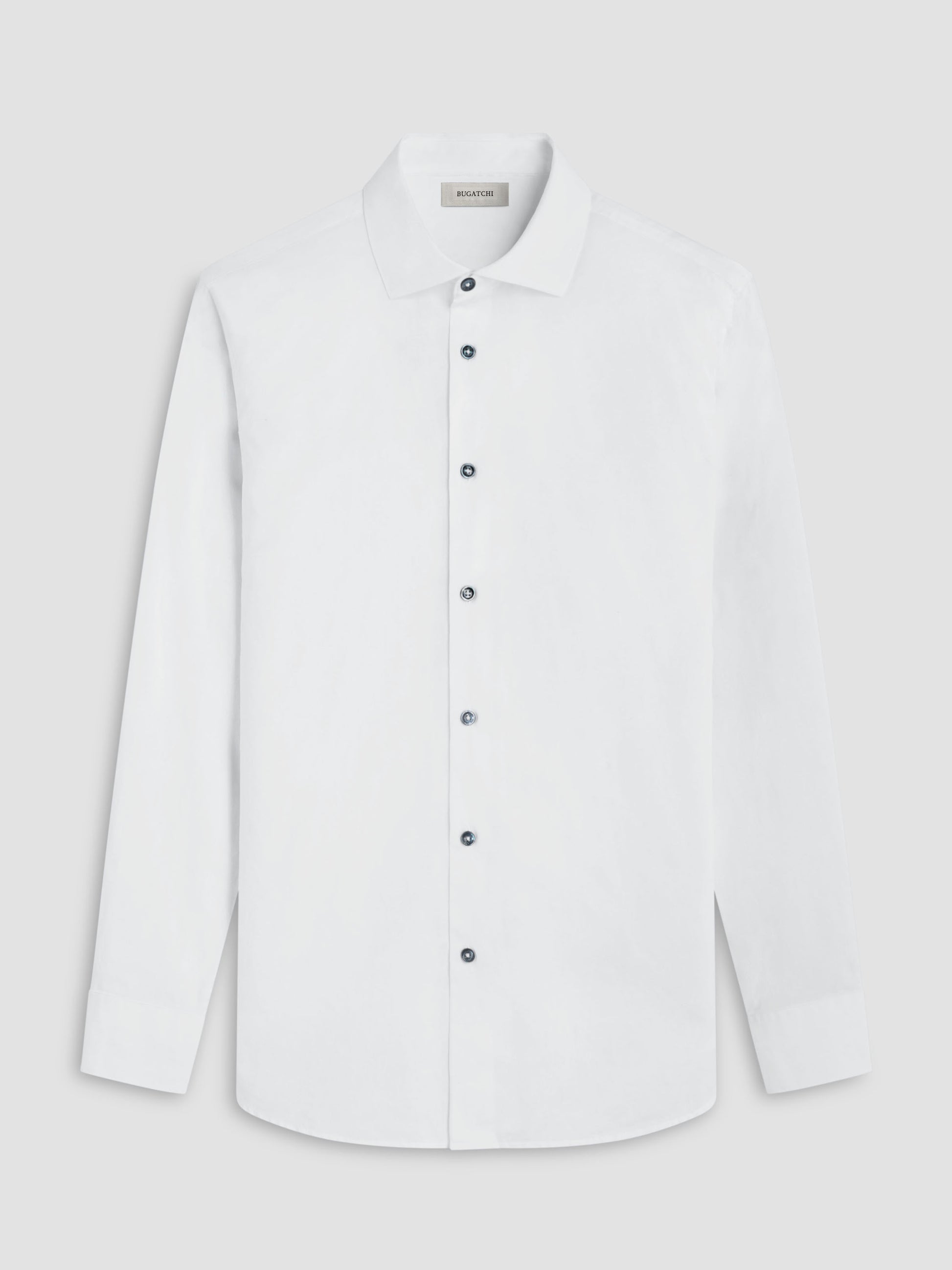 White dress shirt with black buttons on a light gray background