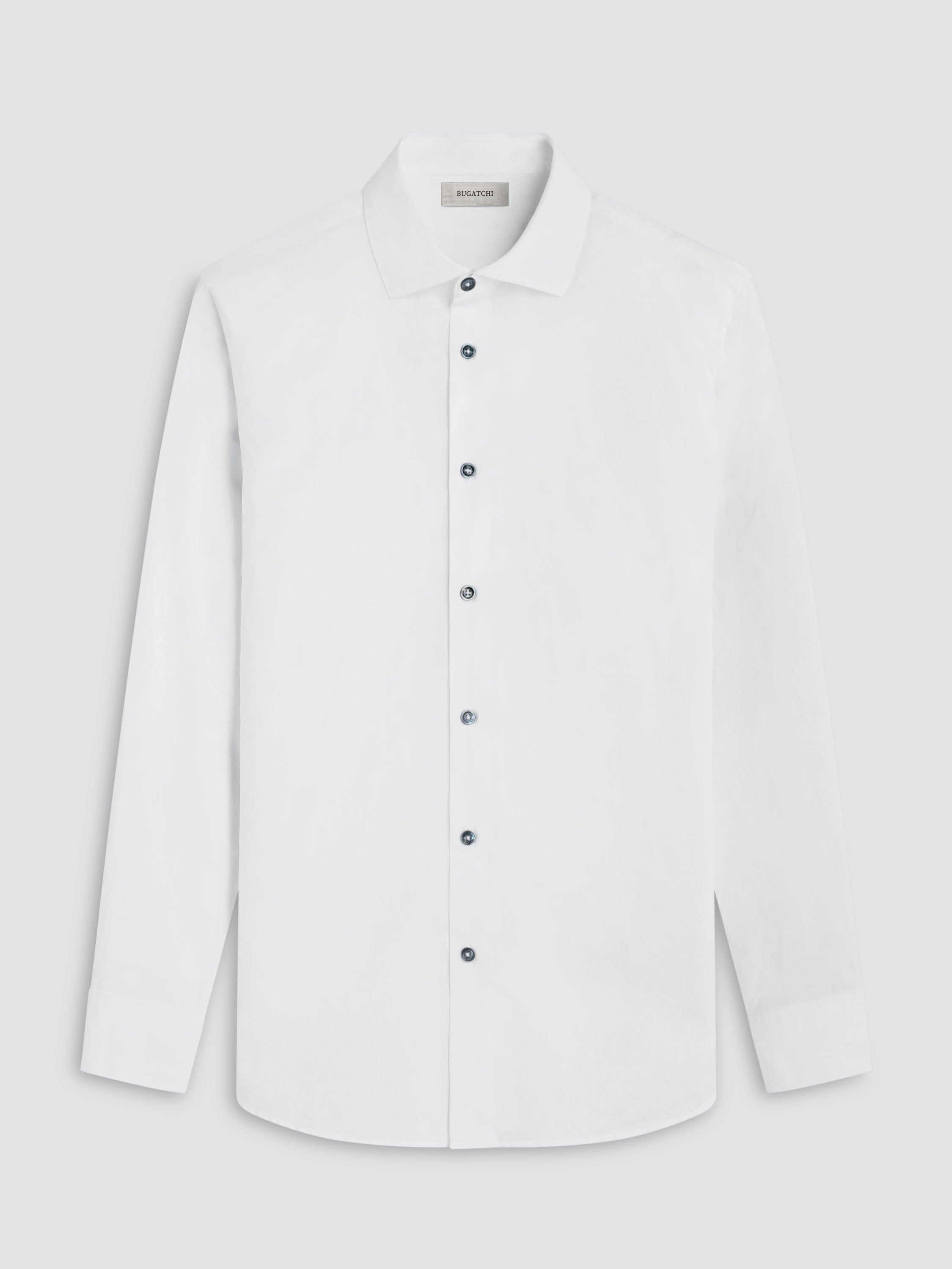 White dress shirt with black buttons on a light gray background