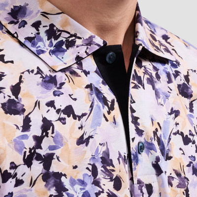 Close-up of a floral patterned shirt with a blurred background