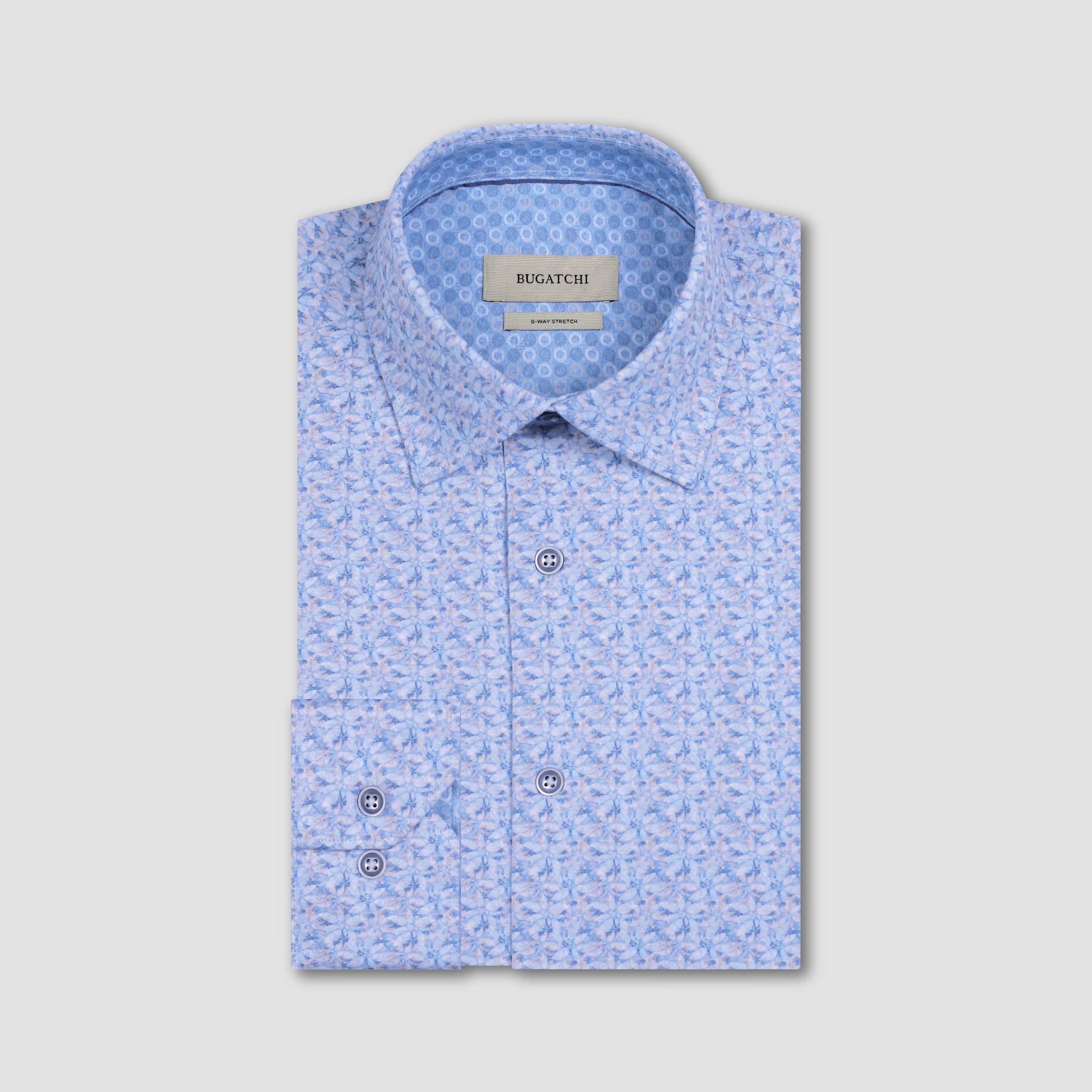 Blue patterned shirt with 'Bugatchi' label on a light gray background