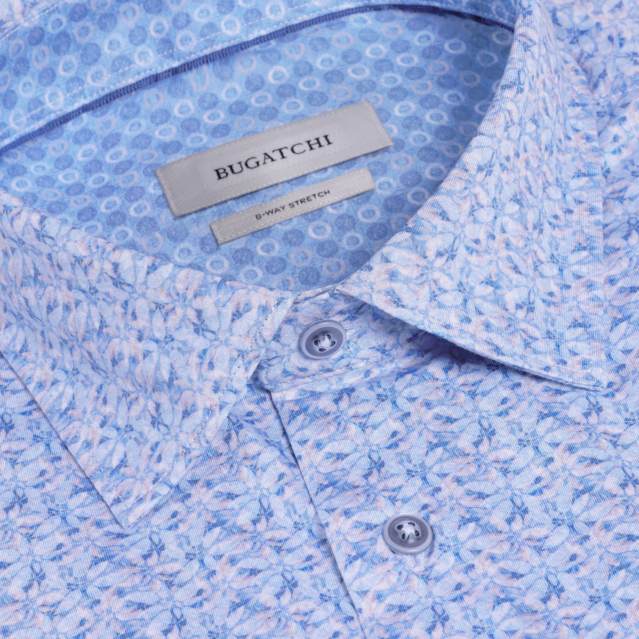 Close-up of a blue patterned shirt with Bugatchi label