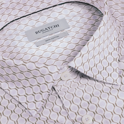 Close-up of a patterned shirt with a Bugatchi label.