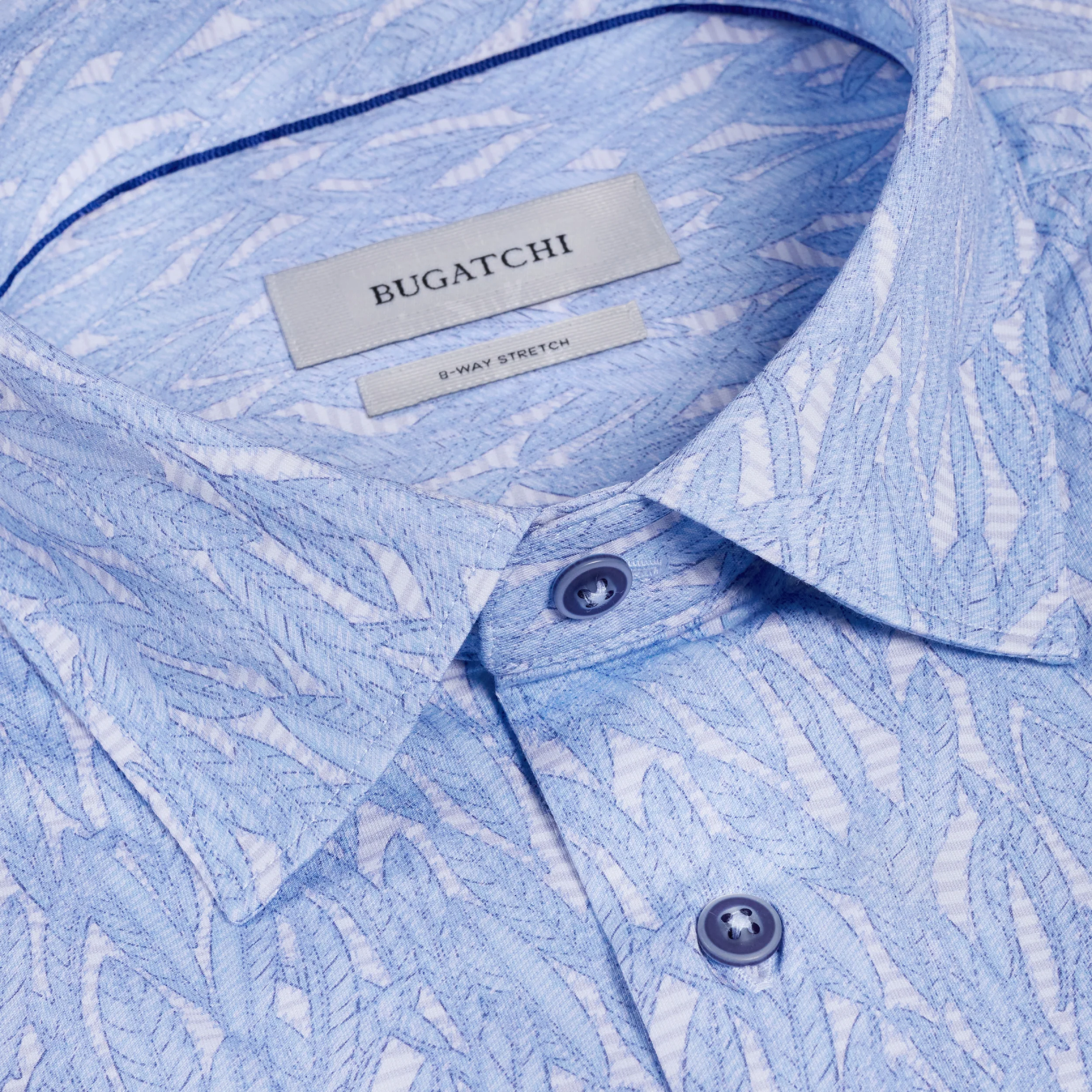 Close-up of a blue patterned shirt with Bugatchi label