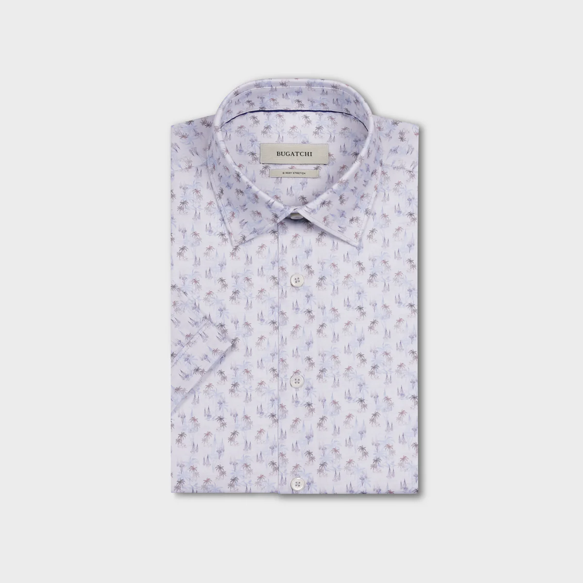 sailboat-patterned shirt on a light gray background