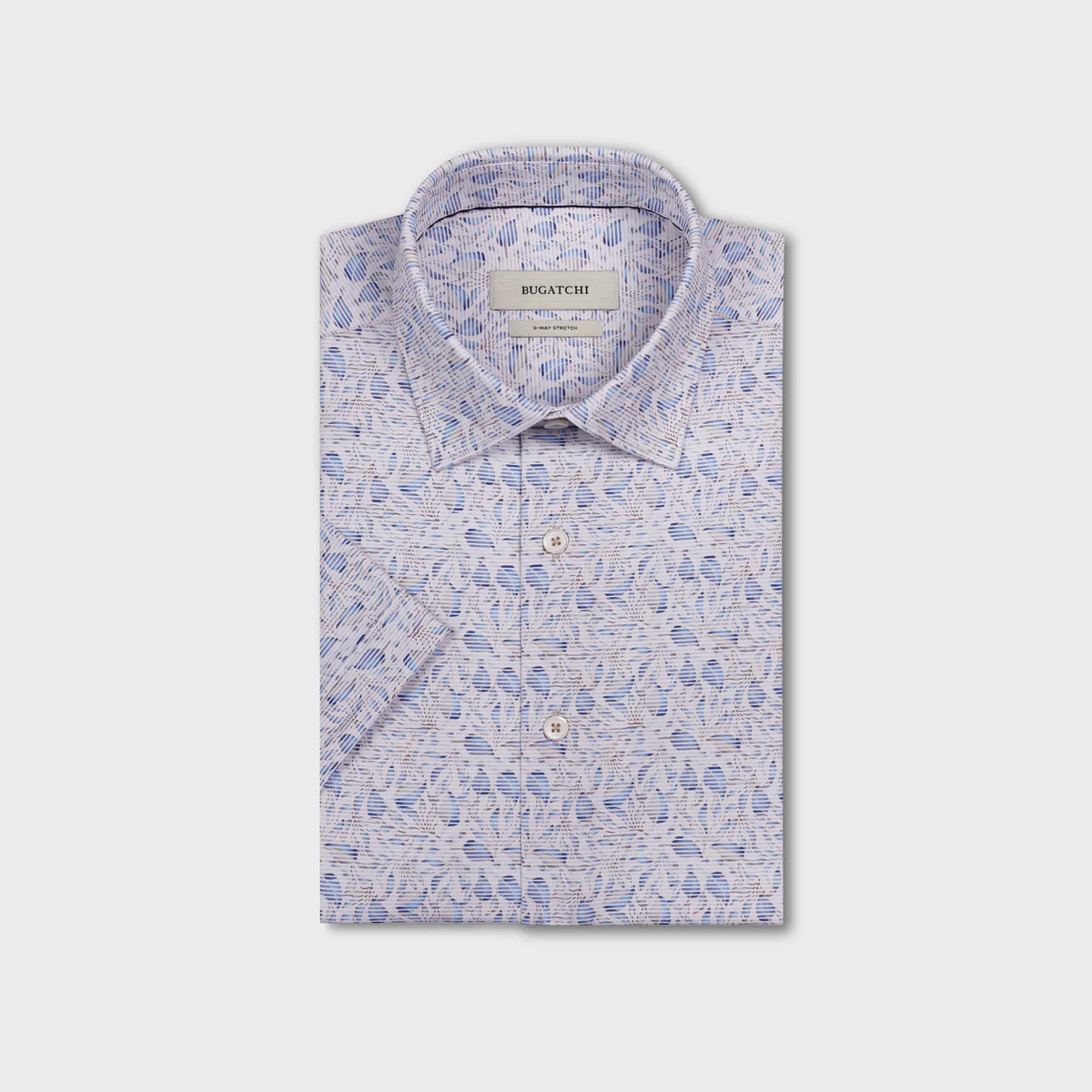 Folded shirt with blue floral pattern on a light gray background