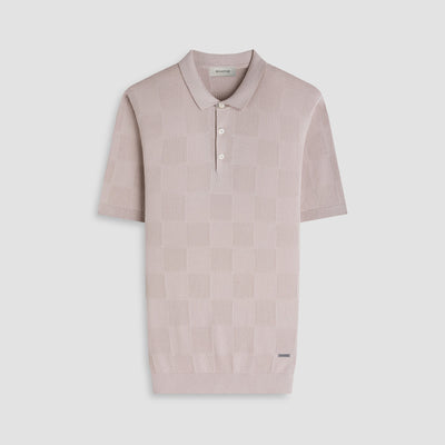 Light pink ribbed polo shirt on a light gray background