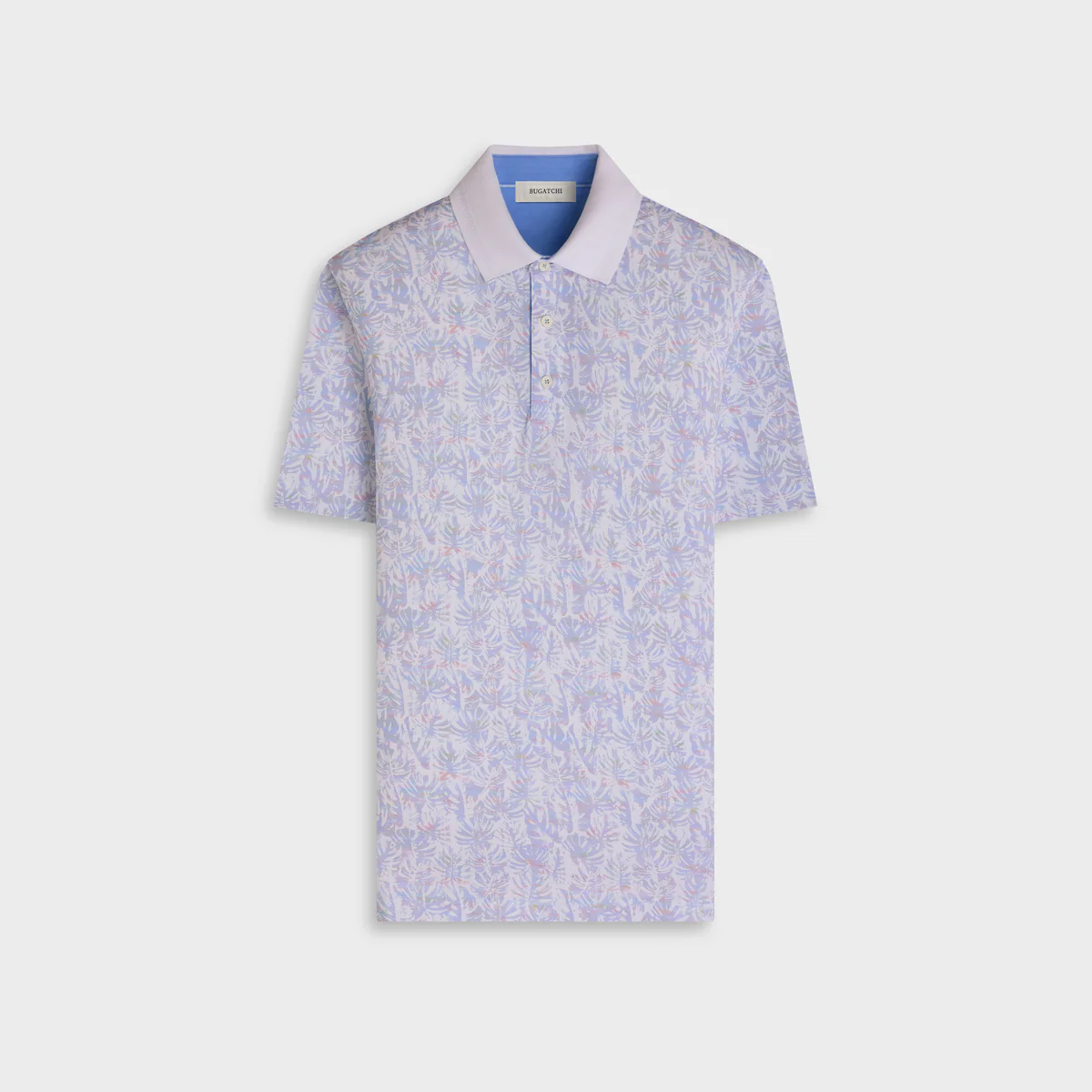 Floral patterned polo shirt on a light gray background