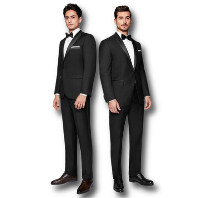 Two men stand side by side in Paul Betenly Tuxedos with bow ties, white shirts, and pocket squares against a plain background, showcasing modern fit formalwear from Paul Betenly.
