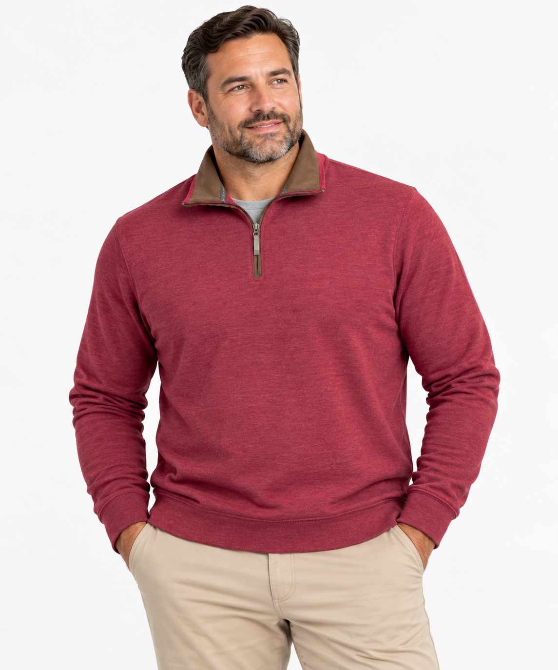 Man wearing F/X Fusion Men’s Big & Tall Burgundy 1/4 Zip Sweater with a tan collar and beige pants, standing with hands in pockets against a light background.