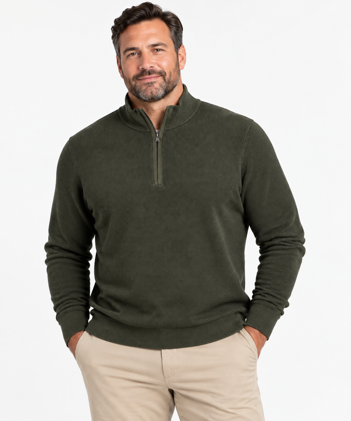 A man with short brown hair and beard wears the F/X Fusion Men’s Big & Tall Thermal 1/4 Zip Sweater 13050 and beige pants, standing with hands in pockets against a white background.