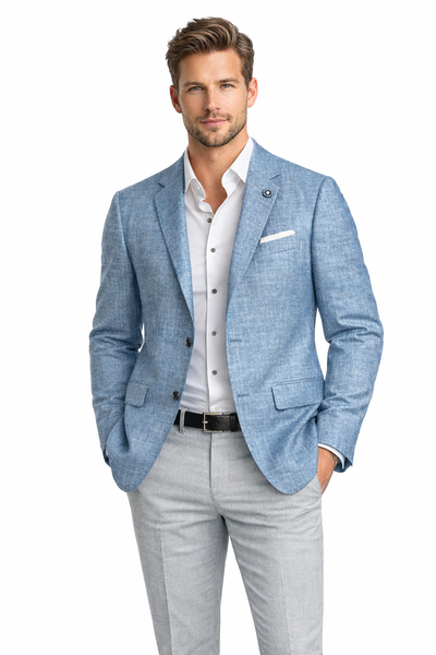 A man wears a Hart Schaffner Marx New York Sport Coat 30C0193 in light blue, a white dress shirt, light gray pants, and a black belt, standing with one hand in his pocket against a white background.