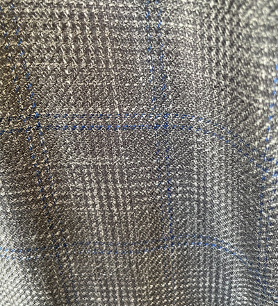 Close-up of textured fabric with a check pattern