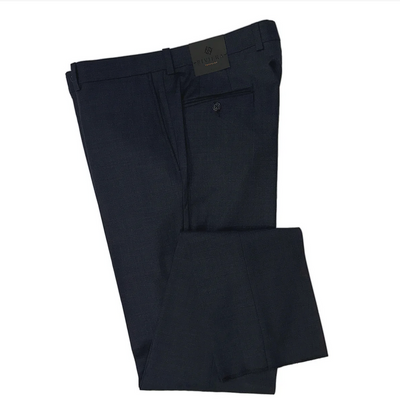 Folded black pants with a brand label on a white background