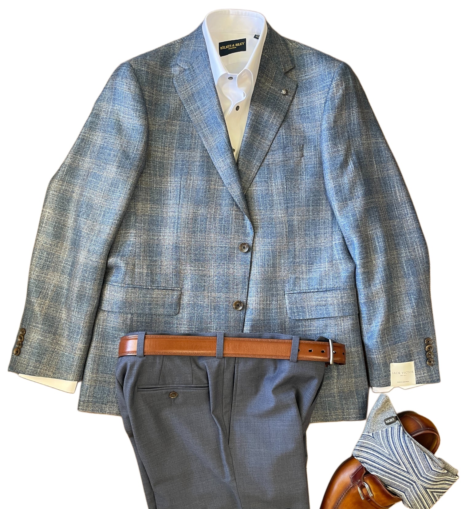 Blue plaid suit with gray pants and brown belt on a white background