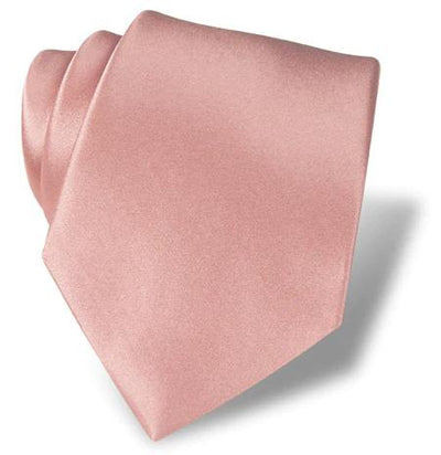 The DION Solid Silk Tie by Dion, in light pink, is folded neatly against a white background—ideal for formal wear in Toronto.