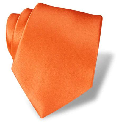 The DION Solid Silk Tie by Dion, in vibrant orange, is neatly rolled and ideal for formal occasions, shown on a white background.