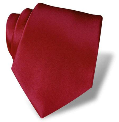 The DION Solid Silk Tie by Dion, featuring a smooth red silk texture, is perfect for formal occasions and is shown against a white background.
