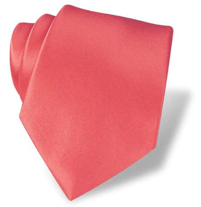 The DION Solid Silk Tie by Dion, shown neatly folded on a white background, offers an elegant solid pink option for formal wear in Toronto.