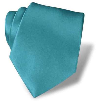 The DION Solid Silk Tie by Dion, in teal, ideal for formal occasions in Toronto, is shown on a white background with a right-side shadow.
