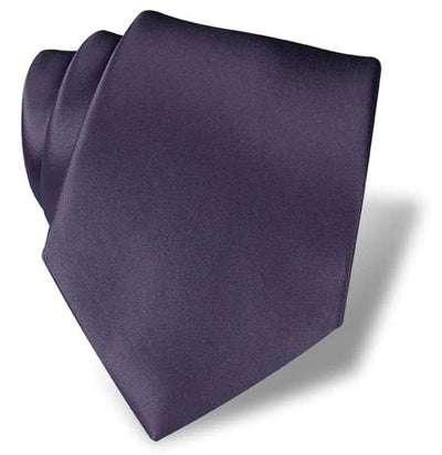 The DION Solid Silk Tie by Dion, shown neatly folded on a white background in deep purple, is an excellent formalwear choice for Toronto.