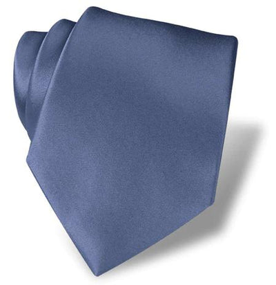 The Dion Solid Silk Tie features a smooth satin finish in solid blue, perfect for formal occasions, shown neatly folded against a white background.