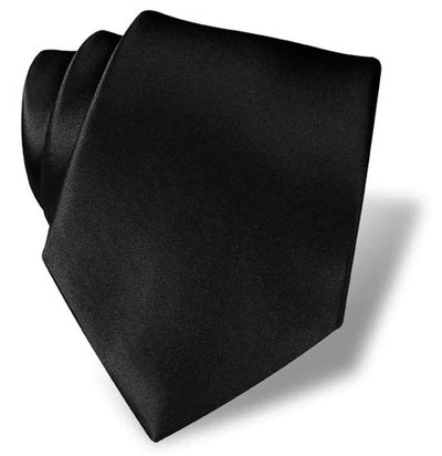 The Dion Solid Silk Tie by Dion is displayed neatly folded on a white background with a soft shadow, offering a classic black design ideal for adding elegance to any formal Toronto event.
