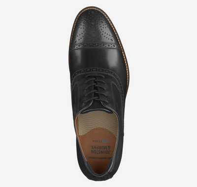 The Johnston & Murphy Conard 2.0 Cap Toe is a black leather Oxford dress shoe with brogue toe detailing, seen from above, showcasing the Johnston Murphy insole with TRUFOAM for cushioned comfort.