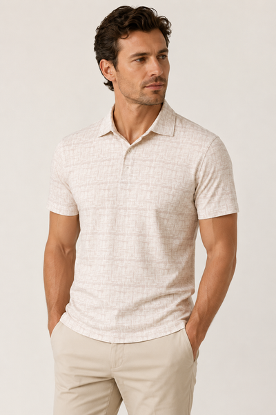 Man wearing a Luchiano Visconti Visconti Short Sleeve Printed Polo MORL3P54 with 4-way stretch knit and tan pants, hands in pockets, looking to the side against a plain background.