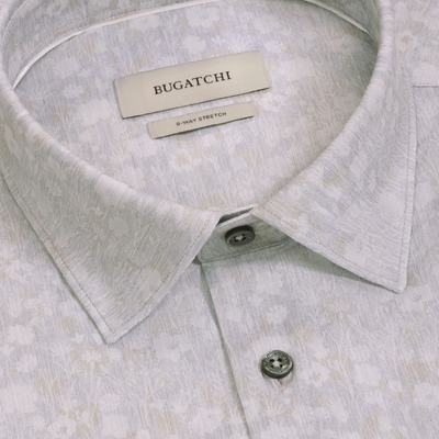 Close-up of the Bugatchi James Floral Sport Shirt KF9142K60, a light-colored shirt with a subtle floral pattern, featuring 8-way stretch and wrinkle-resistant OoohCotton fabric, showcasing the collar, top buttons, and Bugatchi brand label.