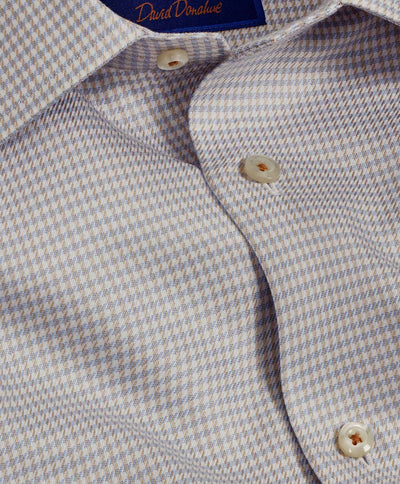 Close-up of the David Donahue Twill Check TBSP10800 dress shirt featuring a small blue and beige check pattern, white buttons, spread collar, barrel cuff, and a visible navy blue David Donahue label inside the collar.