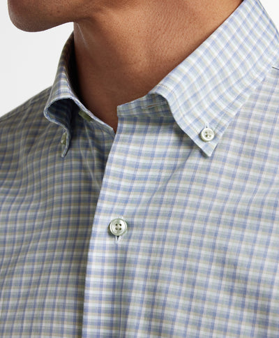 Close-up of a person wearing the David Donahue Sage & Blue Twill Check Sport Shirt (CBBD1283337), featuring a plaid twill check pattern and buttoned collar.
