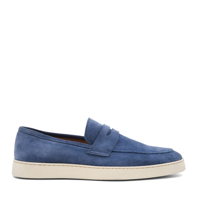 The Bruno Magli Prato Slip On Loafer by Bruno Magli is a blue suede loafer with a white rubber sole, shown in a side view against a white background.
