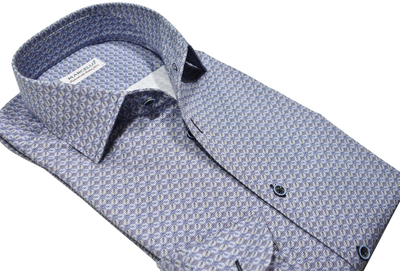 A folded Marcello Shirt Kirkland Abstract W-033R men's long-sleeve cotton button-up with a blue and white geometric pattern and roll collar, displayed against a white background.