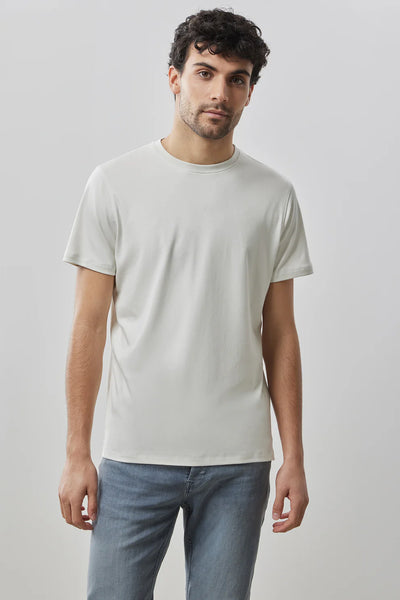 A man faces forward wearing the Robert Barakett Georgia Crew 23336 Tee Shirt in white and light blue jeans, set against a neutral background.