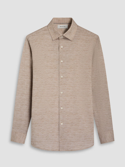 The Bugatchi James Long Sleeve Shirt HF9505K60 features a beige hue, classic collar, and button-up design, crafted from fine Italian fabrics. Displayed on a white background, this Bugatchi shirt embodies timeless elegance in premium menswear.