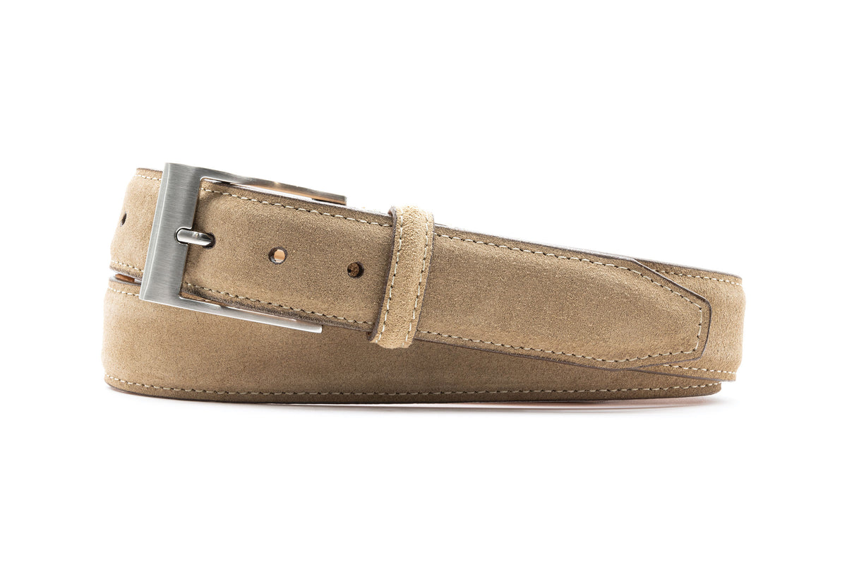 Martin Dingman Royal Suede Belt with classic styling and a silver buckle, coiled flat on a white background.