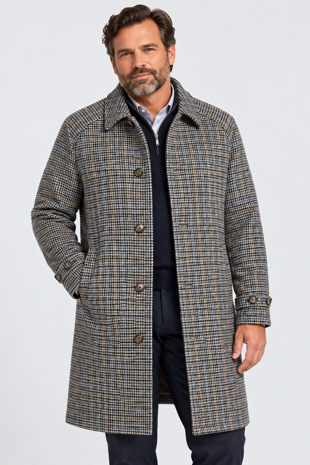 A man wearing a Hart Schaffner Marx Randolf Mini Check Coat over a zip-up sweater and collared shirt.