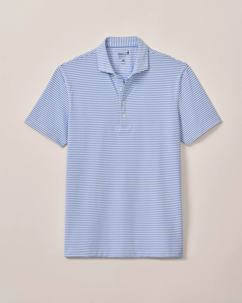 The Johnnie-O Performance Polo- Stetsons by Johnnie-O is a light blue and white striped, lightweight jersey polo with a collar, three buttons, and UPF 50 sun protection, shown laid flat on a neutral background.