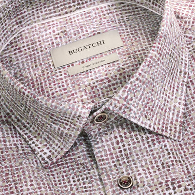 Close-up of the Bugatchi James Abstract Sport Shirt KF9300K60, showcasing its multicolored dotted geometric print along with the collar, label, and top buttons. This Bugatchi shirt is made from wrinkle-resistant cotton for effortless style and comfort.