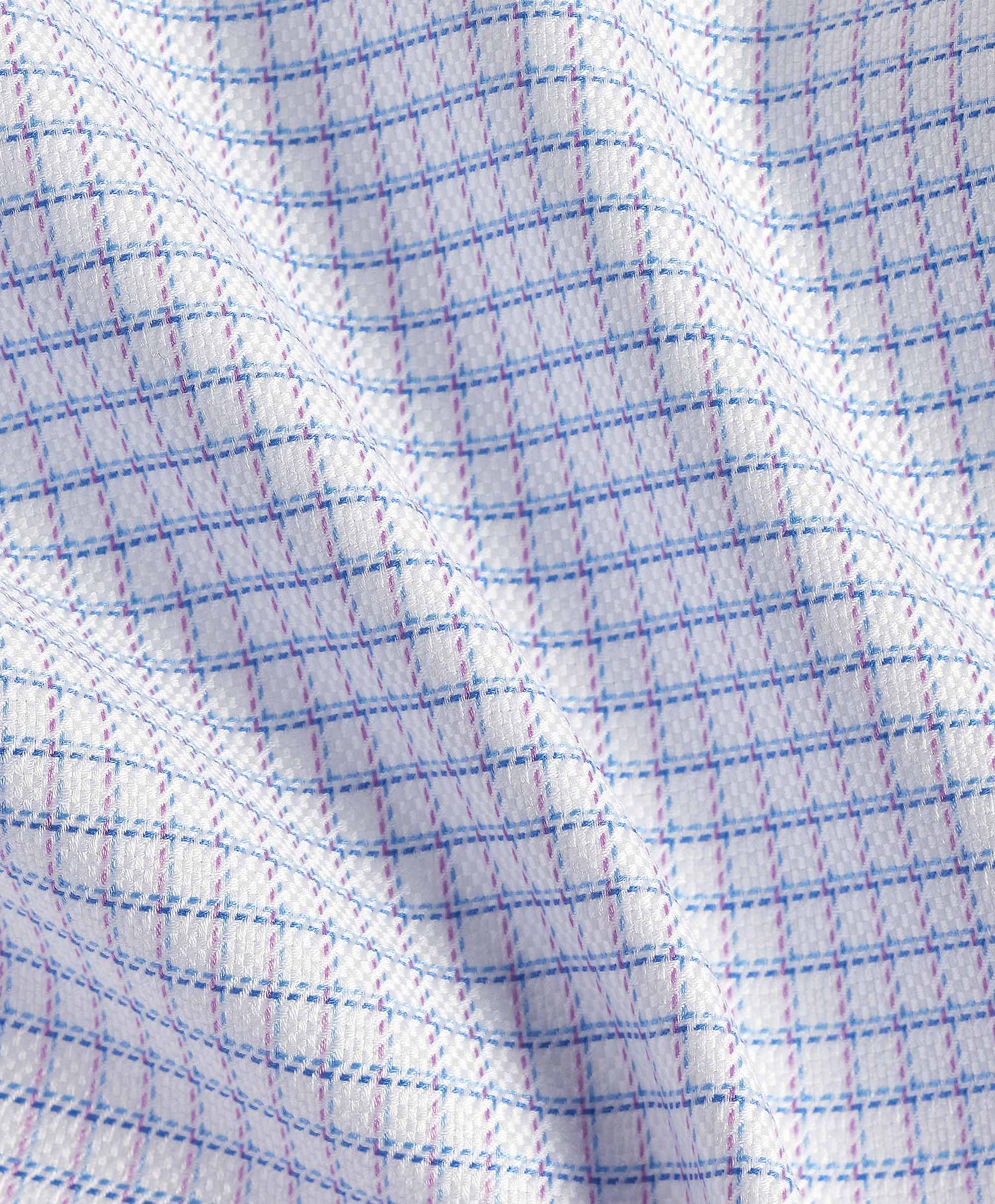 Close-up of a David Donahue OP Check Dress Shirt TBSP12821144, featuring white Pima cotton with blue and pink grid lines, highlighting its texture and gentle folds.